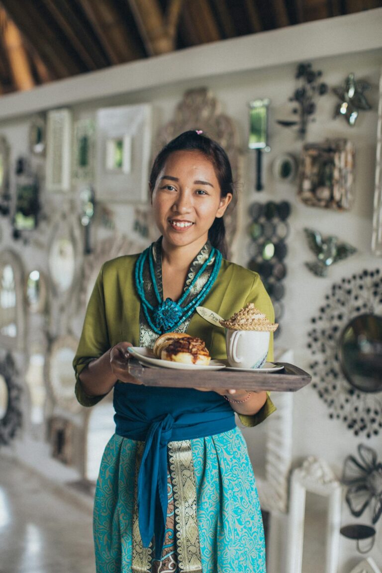 Woman Carrying Brown Wooden Tray 